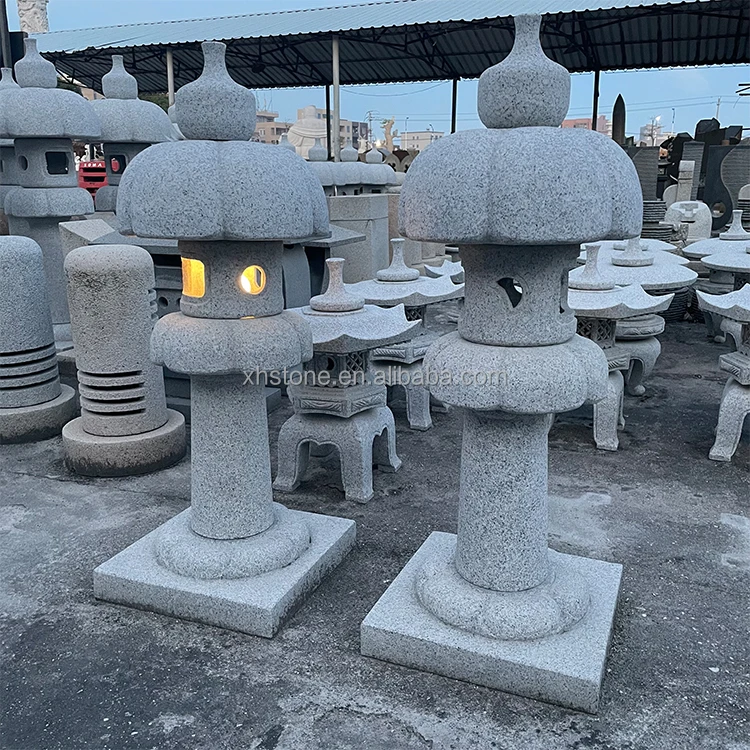 Natural japanese garden stone and cast iron lantern for outdoor