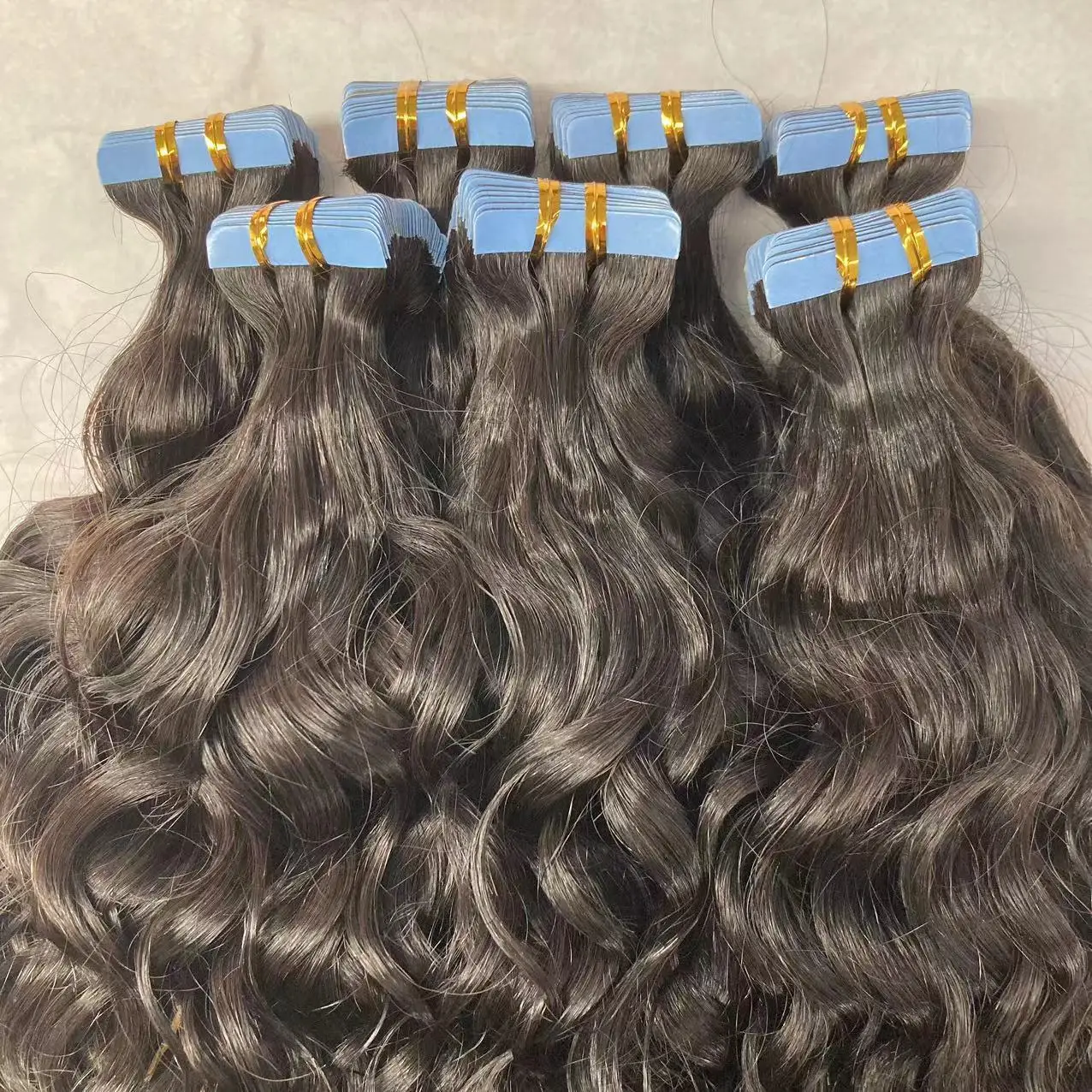Factory direct price tape in hair extensions 100% human hair wave curly tape ins extensions