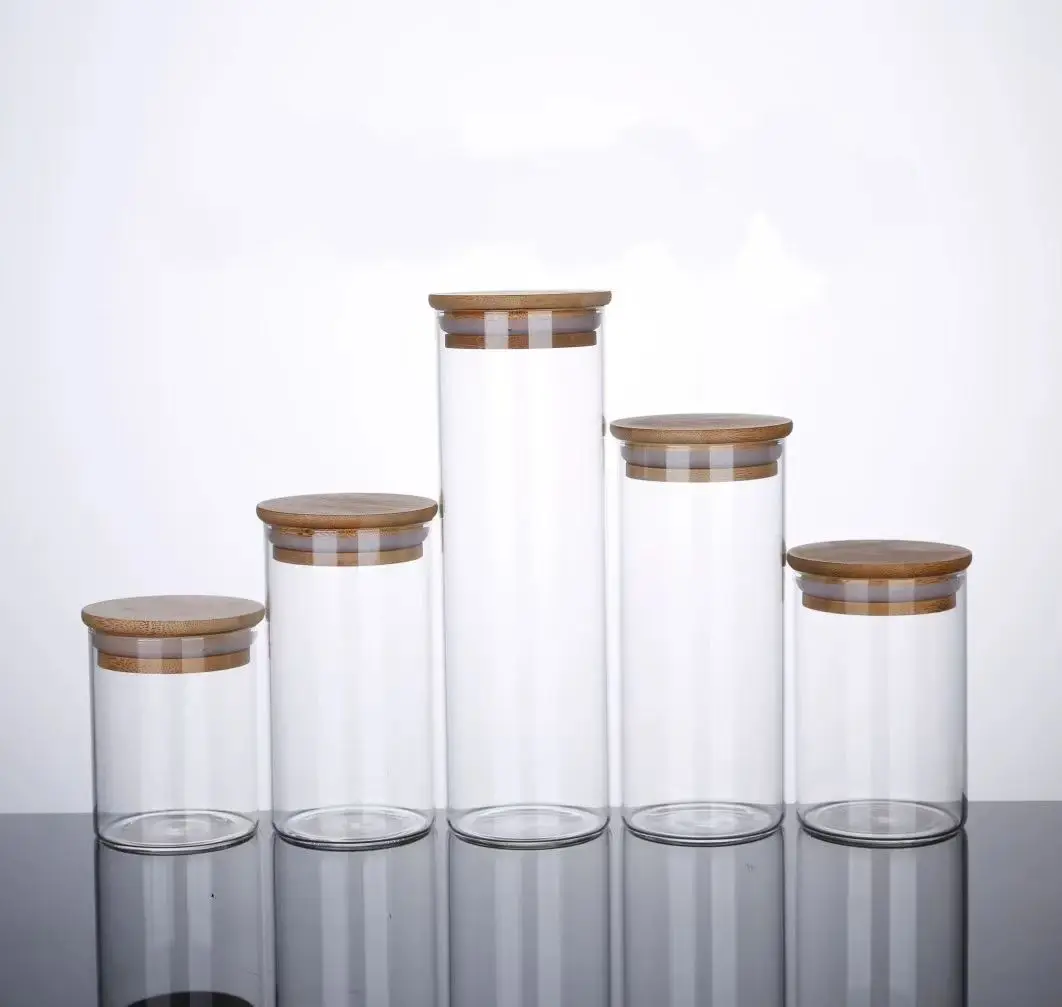 hot sell heat resistant high borosilicate kitchen containers cylinder glass sealed food cereal storage jar with bamboo lid