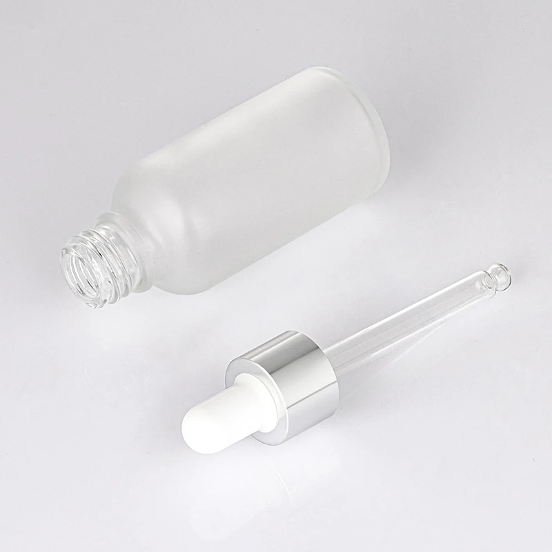 Custom essential oil packaging 1oz 30ml serum high end cylinder transparent frosted white plastic dropper bottle