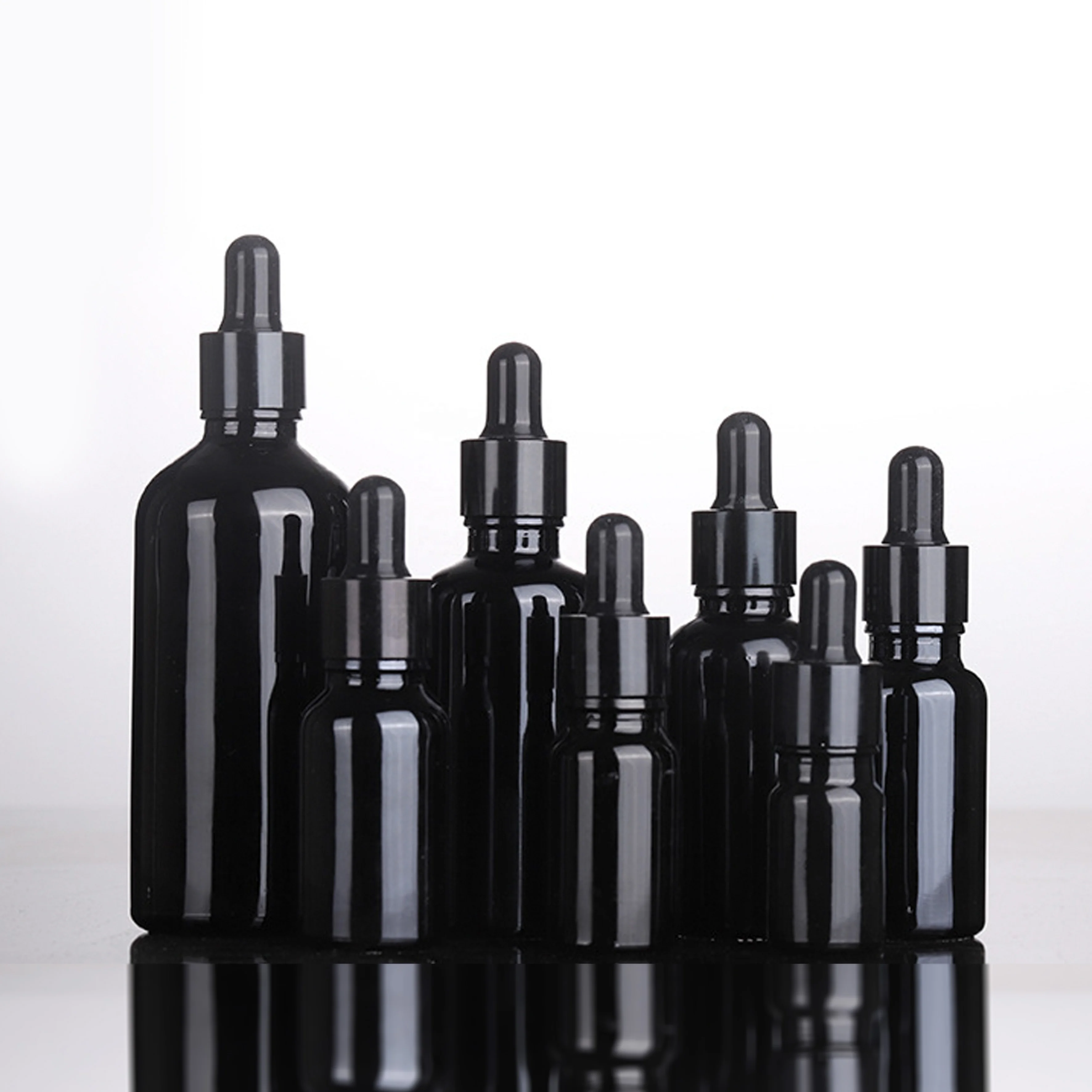 OEM amber clear black 5ml 10ml 15 ml 30 ml 50 ml wholesale essential oil refillable serum pipette bottles dropper bottle