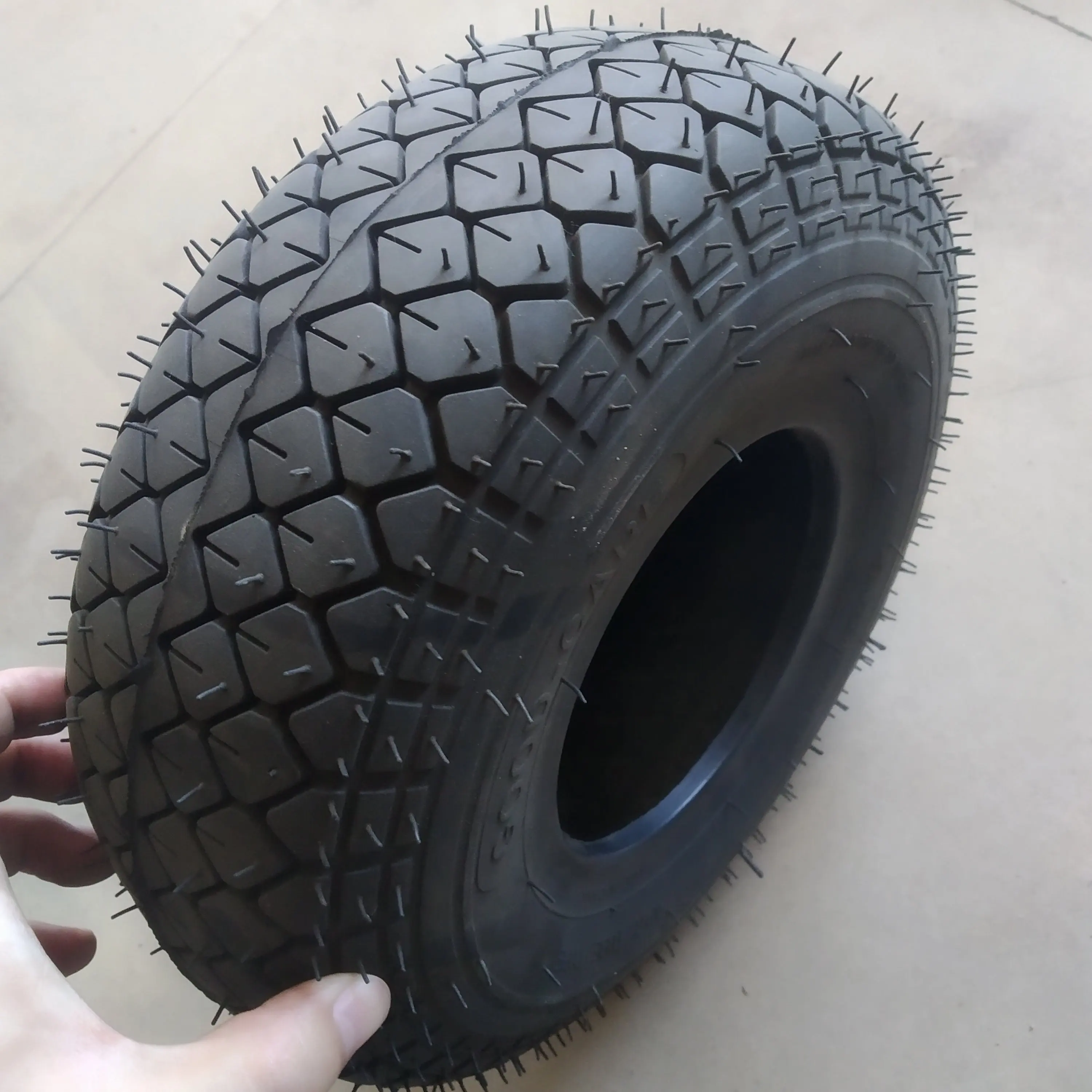 flat free lawnmower tire on wheel