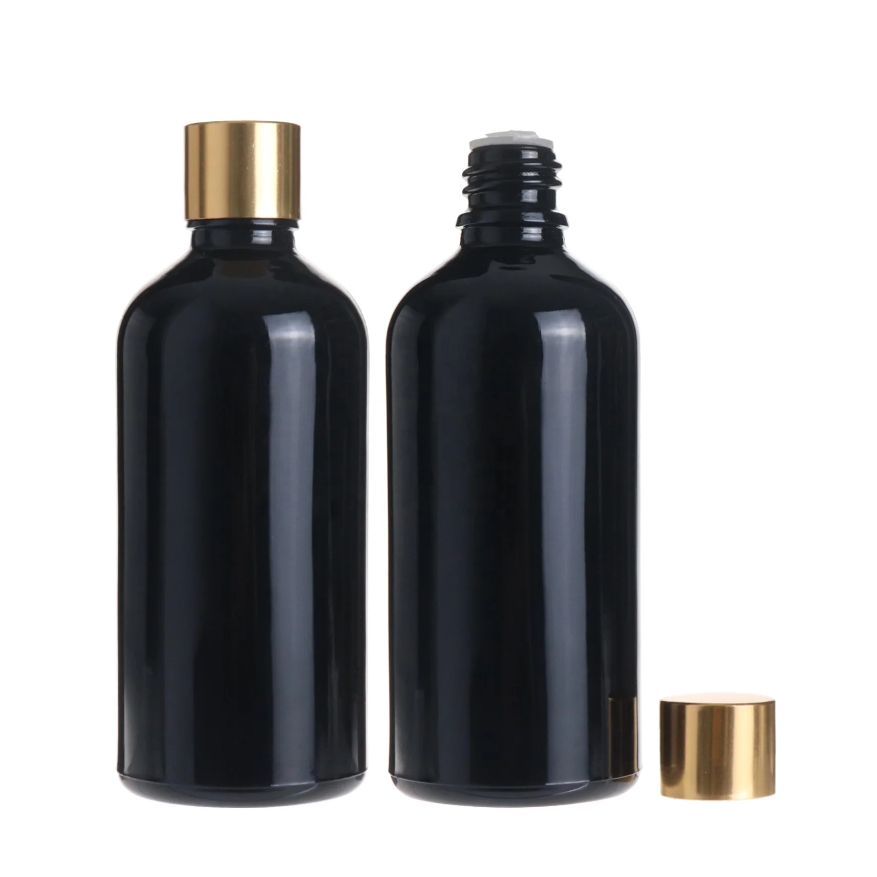 Empty round massage essential oil cosmetic black glass bottle 100ml with golden screw cap