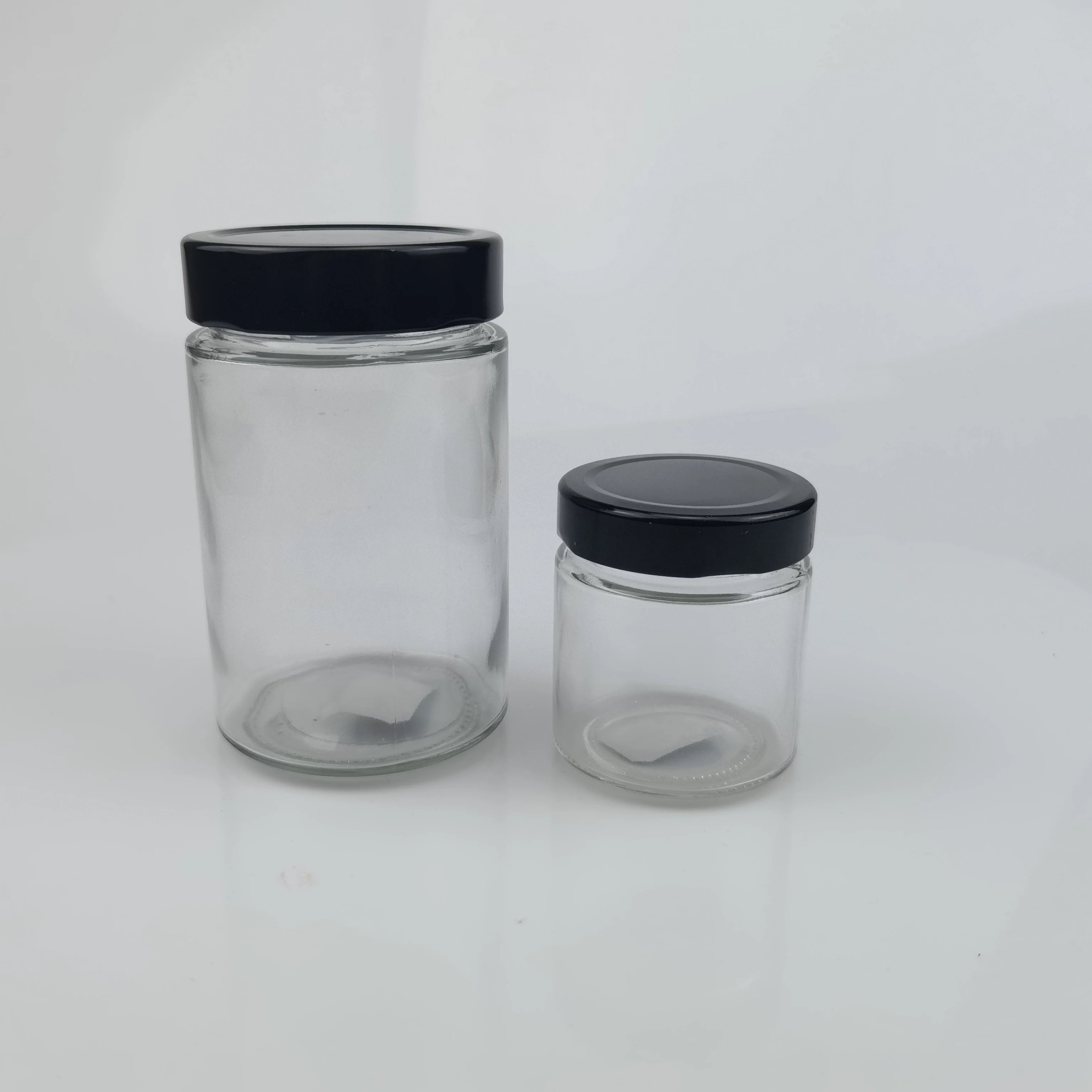 Factory price 100ml 140ml 180ml 200ml 220ml 280ml 212ml Round Shape Ergo Honey Glass Jar with Twist Metal Lid