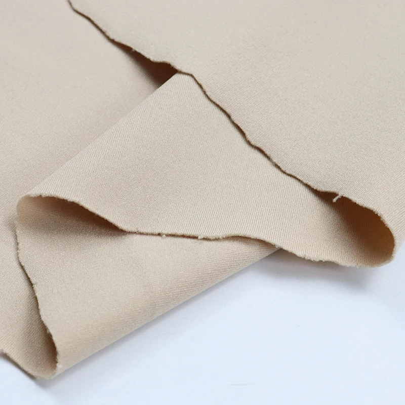 Double-sided plain weave nylon 82% spandex 18% stretch fabric 40/30N elastane weft knitted high elastic half light tight pants