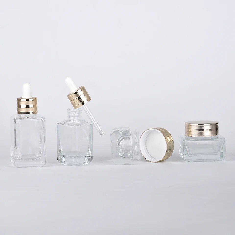 Luxury Cosmetic Container 30ml 50ml Makeup Set Square Shape Clear Glass Serum Bottles With Gold Dropper Cap