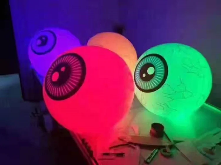 Giant round inflatable eye parties led light pvc inflatable glitter ball for hanging decoration