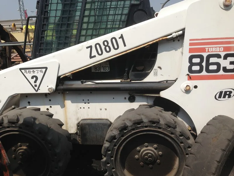 Подержанный небольшой погрузчик Bobcat 863 S160 с бортовым управляемым погрузчиком в хорошем состоянии