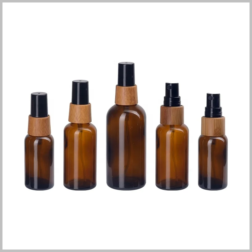 cheap empty essential oil bottles wholesale bamboo spray 18/415 black plastic oil sprayer amber hair oil packaging bottle glass