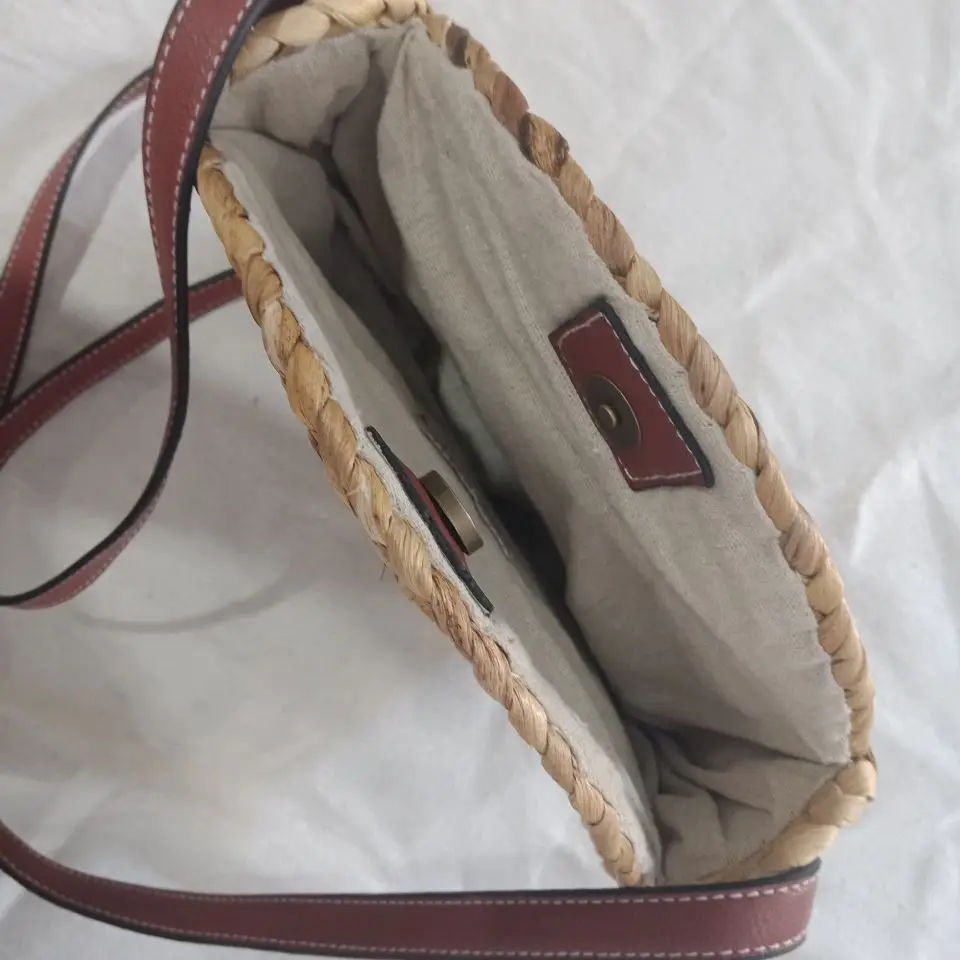 
natural material water hyacinth with inner cloth woven handbag with PU handles 