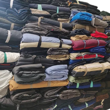 Hot sale warehouse B grade pure cotton plain dyed twill cut piece stock fabric in bales package for shirt