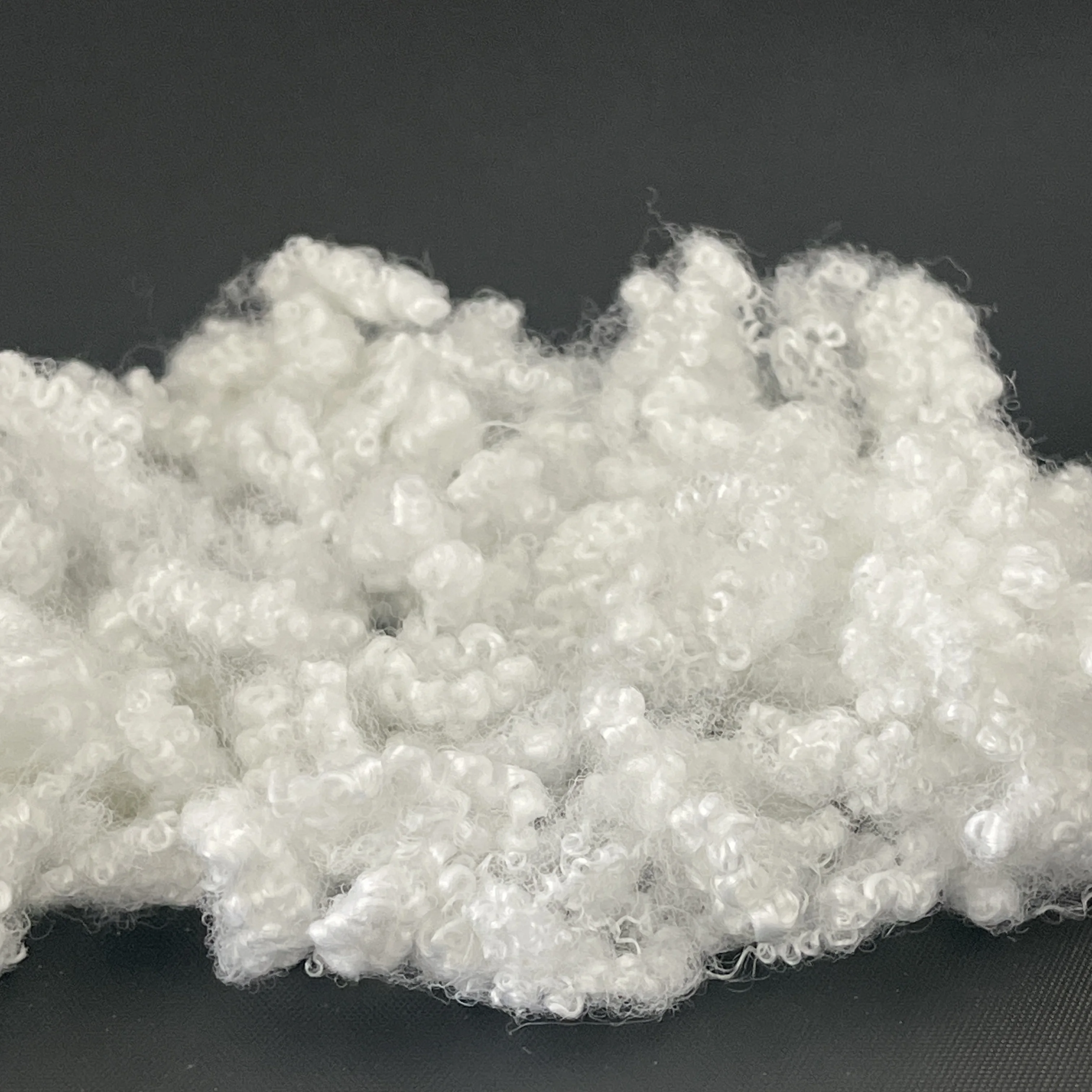 Polyester Hollow Conjugated Silicon Fiber 7D * 64mm HCS Staple for Garment Filling Wholesale