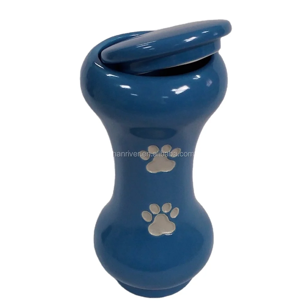 Best selling ceramics bone shape pet urns casket with hand paint paw mark for pets ashes with cover