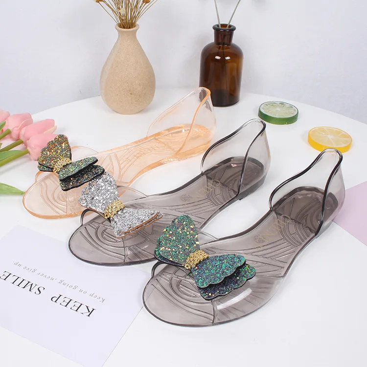 
Professional design crystal fish mouth transparent flat shoes latest rhinestone soft bow Jelly sandals for women and ladies 