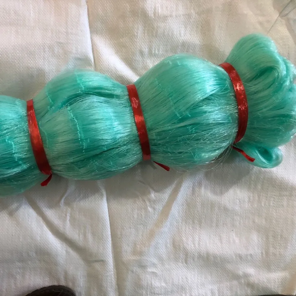 Different sizes of fishing nets which can catch different sizes of fish