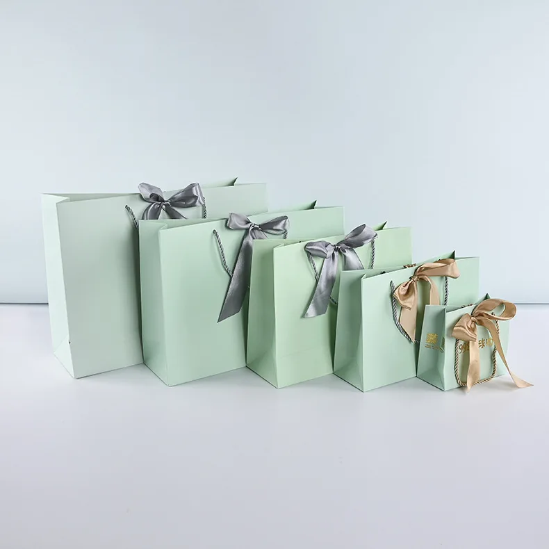 Luxury premium shopping paper bag with your own logo printed packaging de small paper gift bags with ribbon