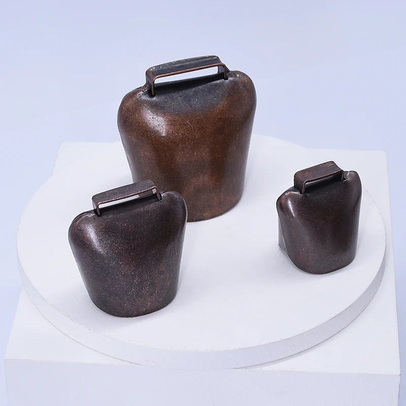 Wholesale direct sale retro style rustic animal small metal bells custom  pet bells pendant  cow bell