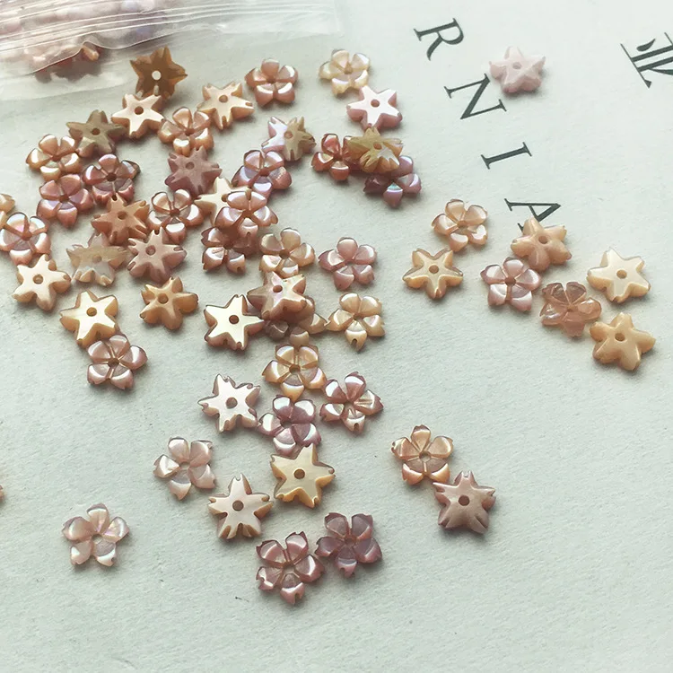 Natural pink flower shape carved mother of pearl shell gemstone