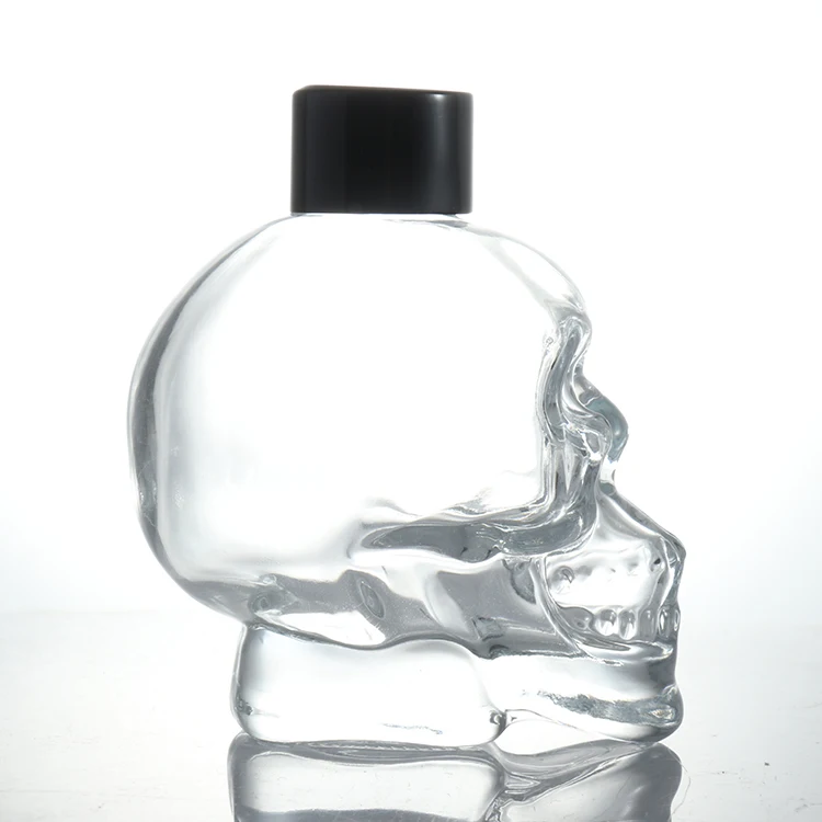 Wholesale Custom Skull Shaped Black Cap 120ml 200ml 400ml 750ml Liquor Reed 5oz Aroma Perfume Diffuser Glass Bottle For Gift