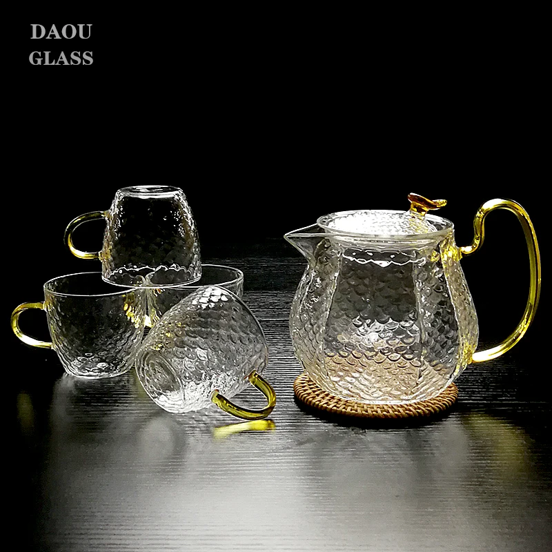 
Handmade clear glass tea sets come with teacups and filters 