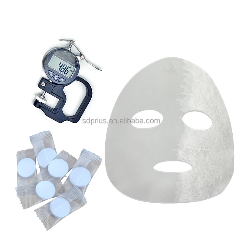 Compressed Facial Mask Cupro Spunlace Nonwoven Fabric Lyocell Dry Facial Mask Sheet Compressed Non woven Fabric Manufacturer