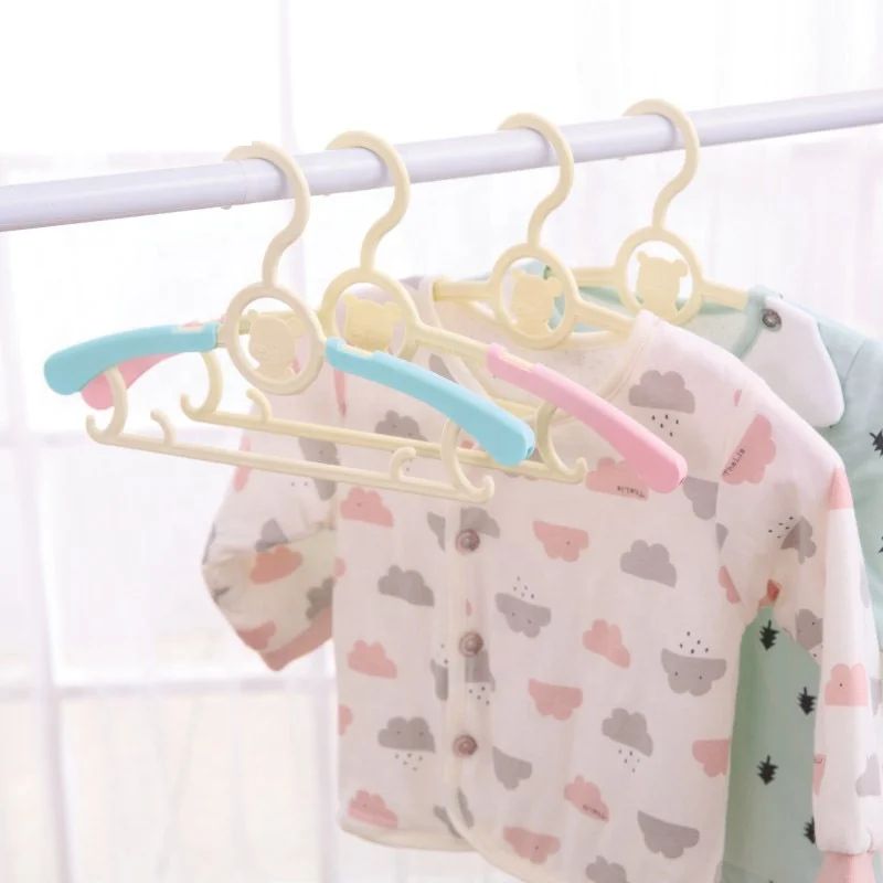 Wholesale Factory Groove Design Scalable Heavy-Duty Plastic Baby Clothing Hangers for Baby Children Kids