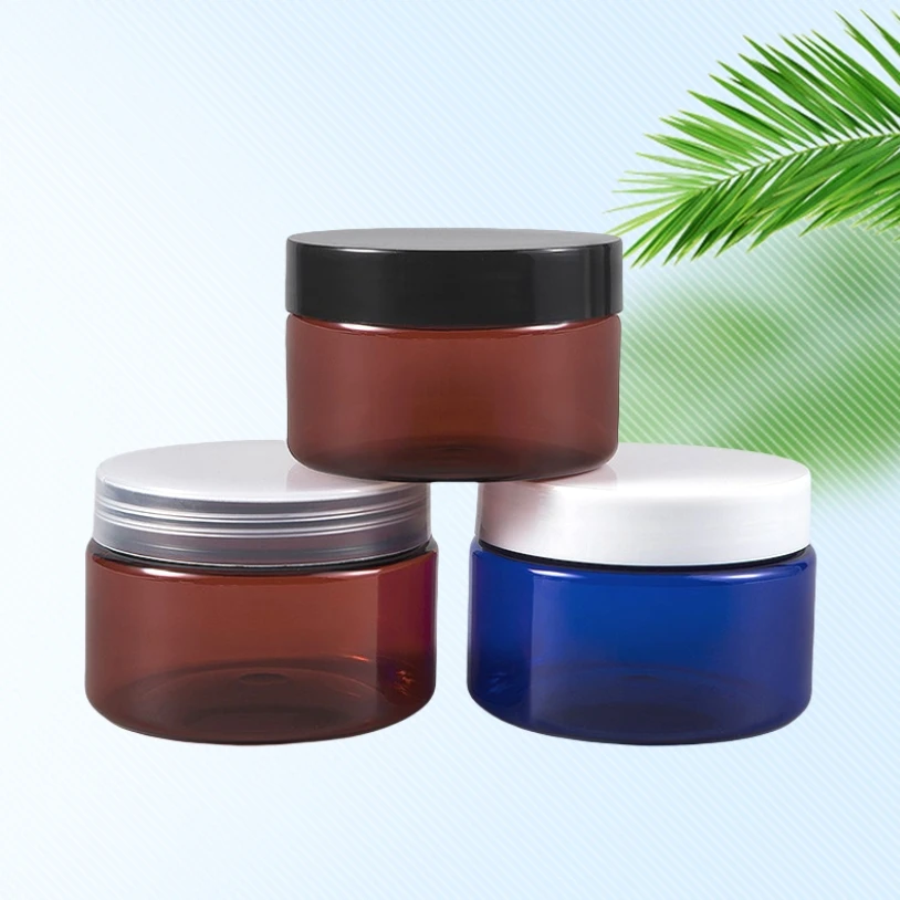 Custom thickened amber blue plastic tea packaging jar 50g 80g cosmetic cream jar for honey packaging