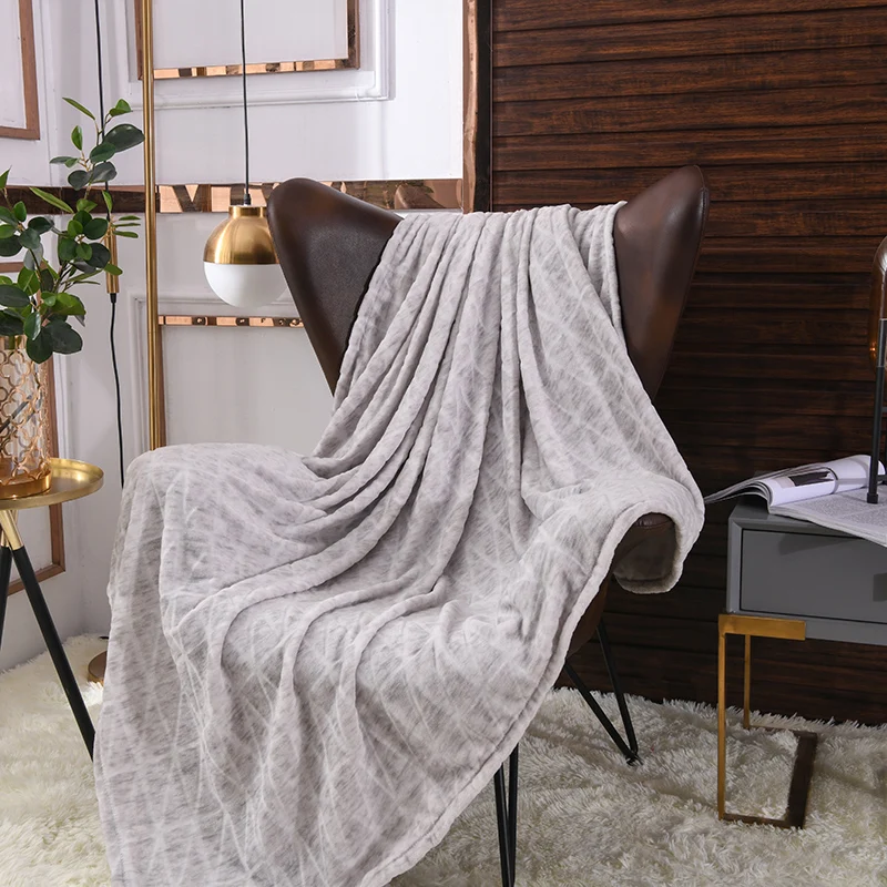 Flannel  throw/blanket  with  printed  and  carved  design