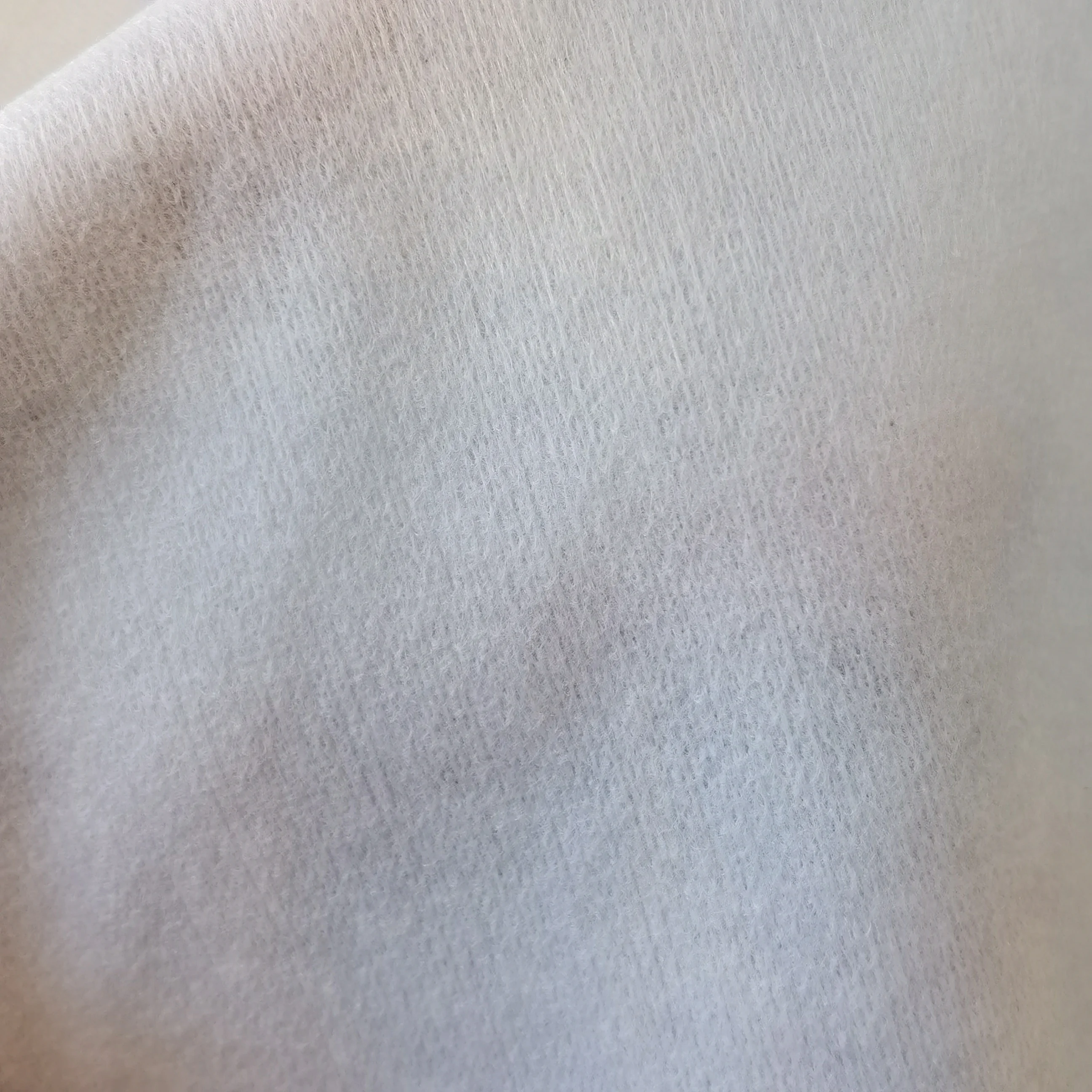 airlaid pet non woven fabricPlian Emboss Pattern Spunlace Nonwoven Fabric for Tissue Paper