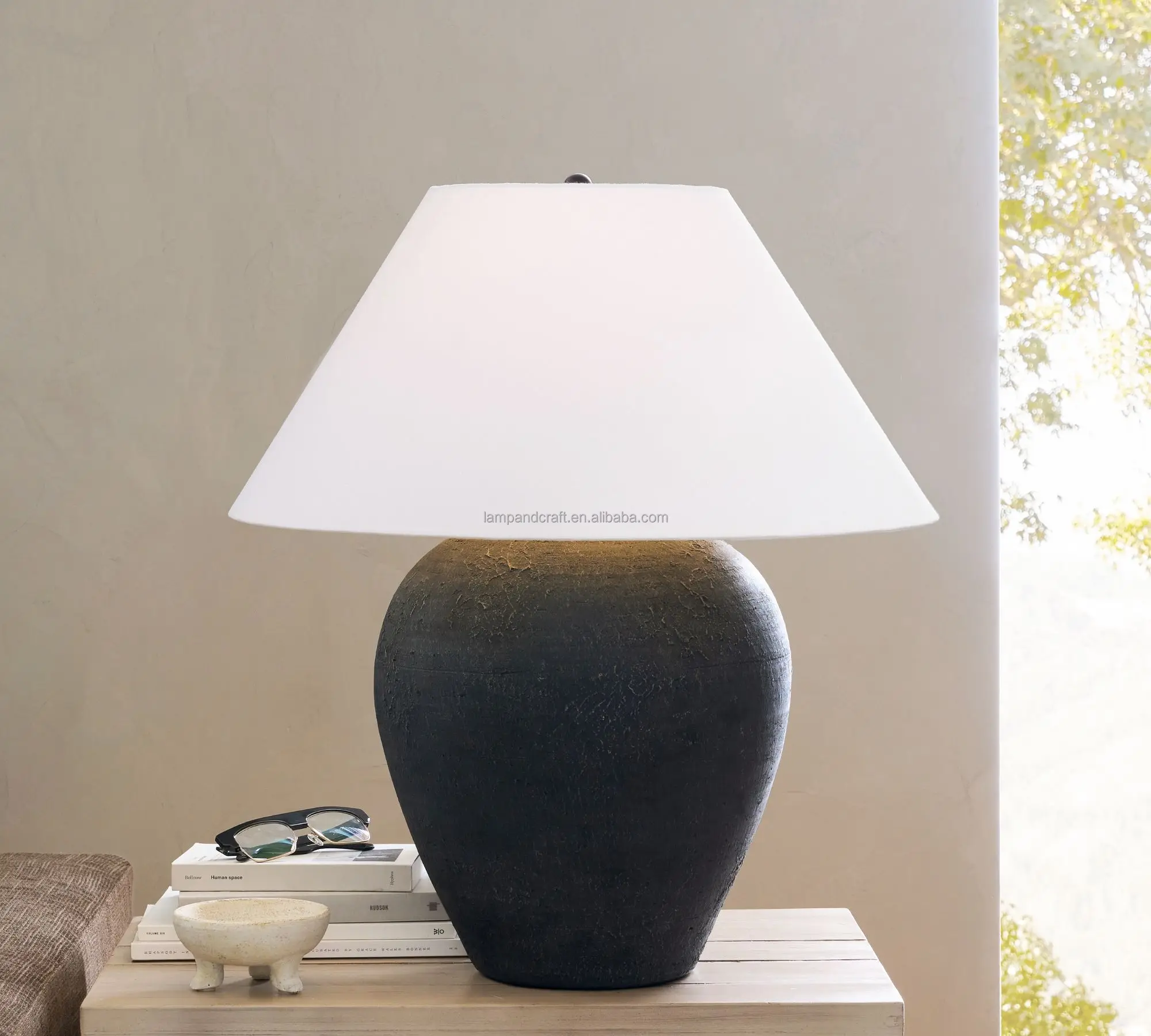 ceramic base table lamp Includes a cream linen drum shade