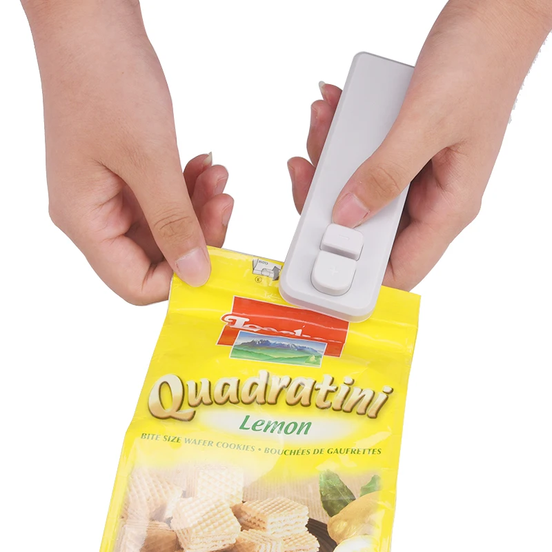 Hot Selling Popular Portable Manual Plastic Bags Sealers Vacuum Food Sealers Mini Heat Sealing Machines with Cutter