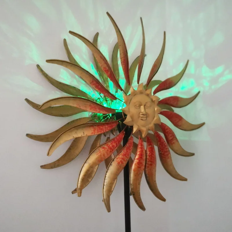 yard art metal sun face colour changing solar wind spinner spiral light