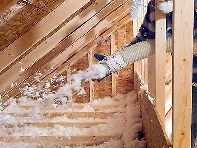 Fiberglass spray blowing-in insulation for wooden houses