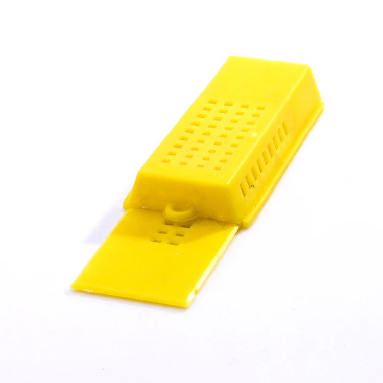 Yellow plastic bee queen cage for beekeeping equipment
