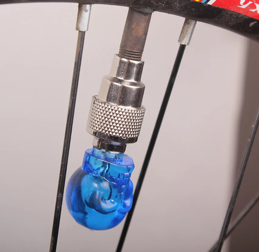 Bicycle Ghosts Skeleton Head Wheel Tire Valve Cap Light Safety Warning Flashing Diamond Shape Lamp