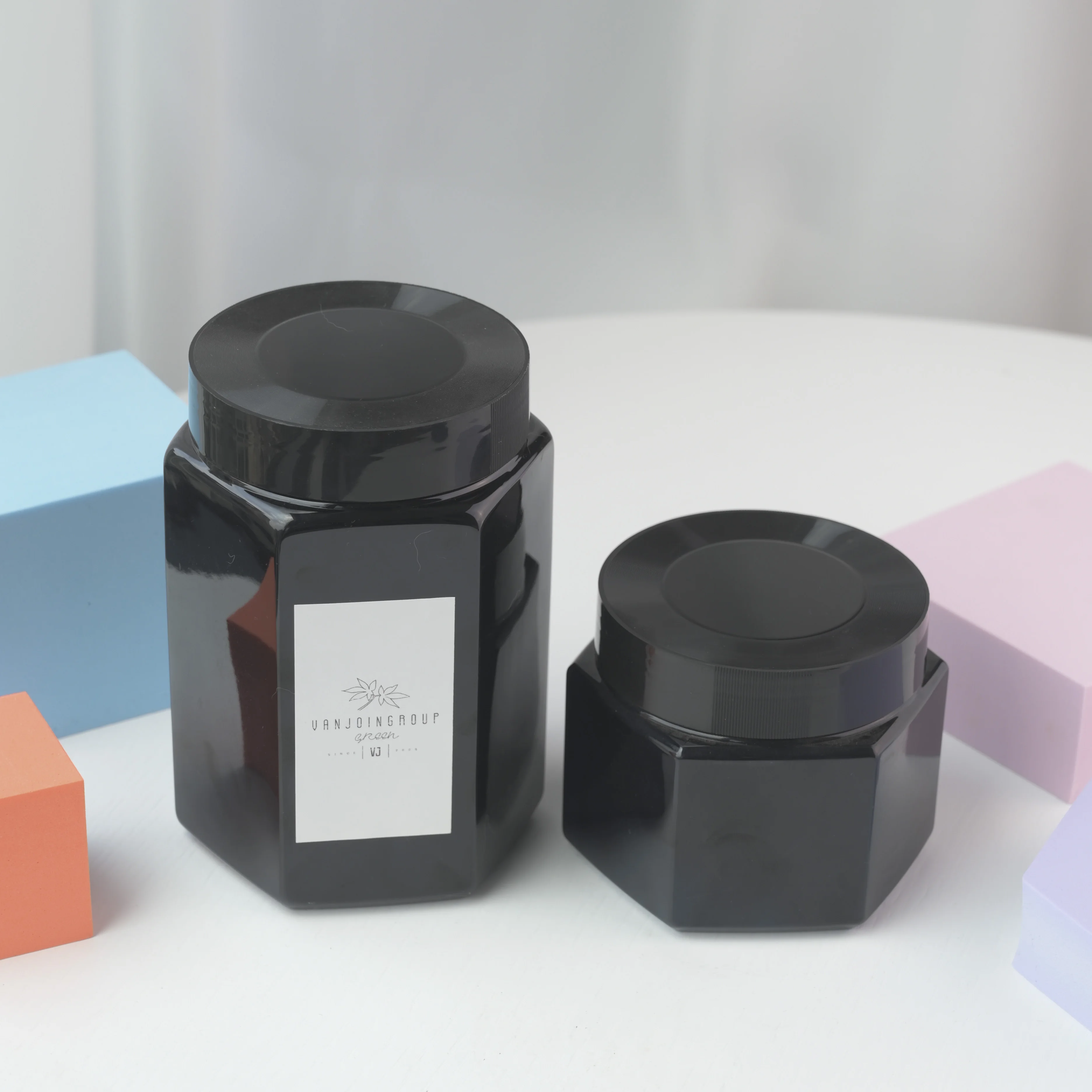 Wholesale amber color hexagon shape 500g 1000g pet plastic honey jar with Airtight Lids
