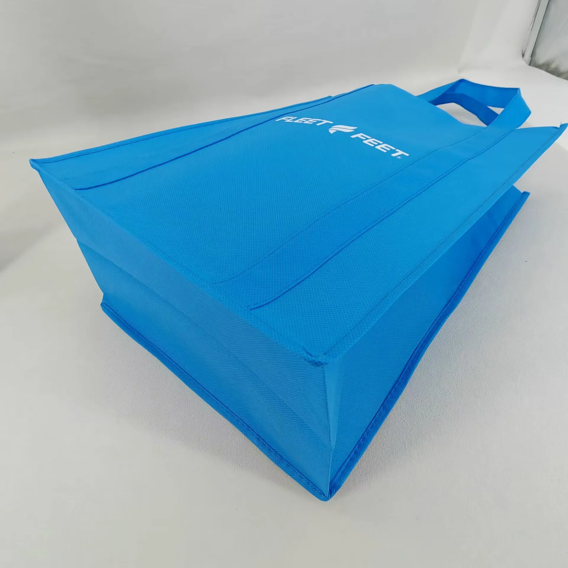 Custom large durable custom logo printed pp non woven fabric store grocery shopping bag with strong long handle