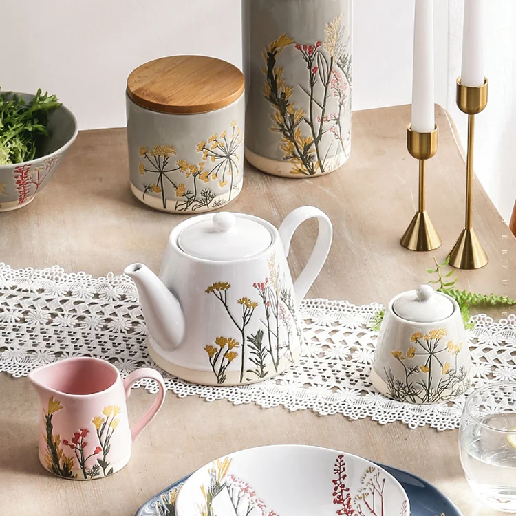 Wholesale european style fancy handpaint embossed pink white porcelain gift tea cup and saucer set gift floral luxury tea sets