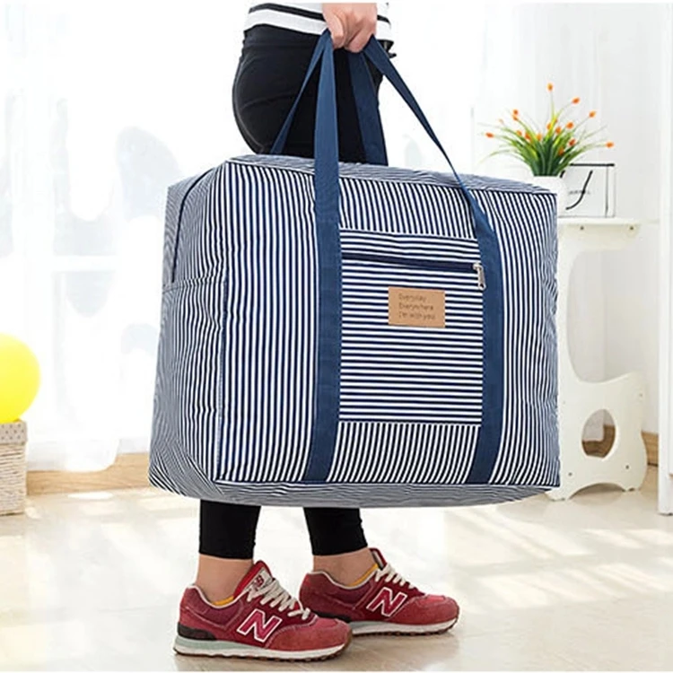 Free sample  multifunctional striped handheld clothes quilt Large oxford storage bags for travel luggage