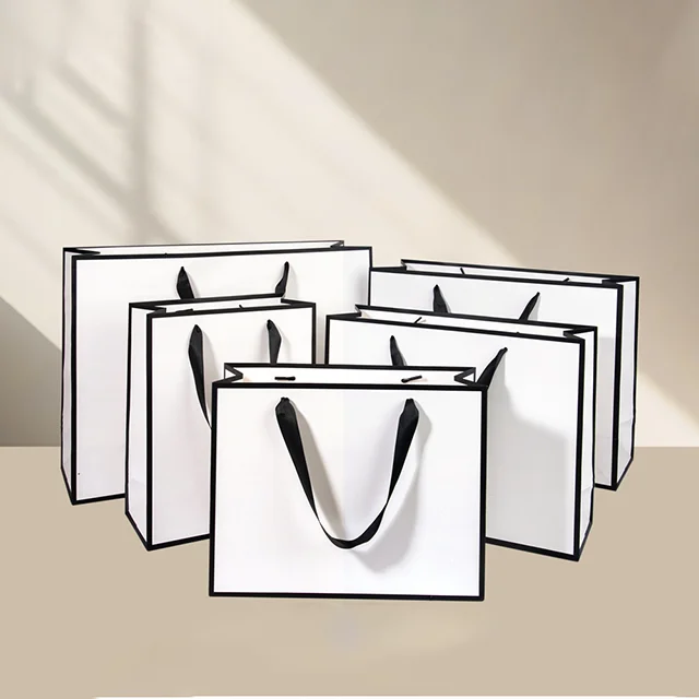 Best Selling Custom Luxury Ribbon Handle White Cardboard Shopping Packaging Bag With Your Own Logo