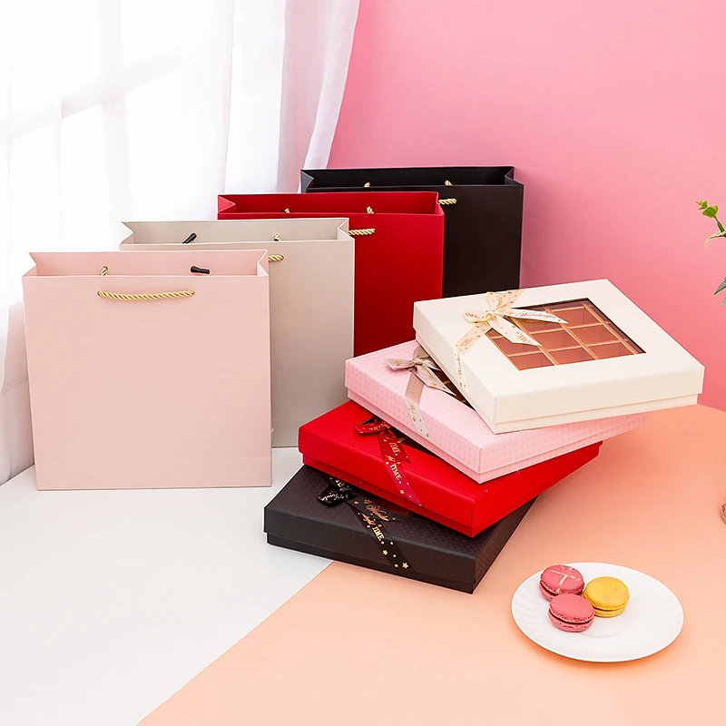 Custom-made High-end high-quality pink cardboard box with ribbon bow decor lid and custom logo for chocolate macaron