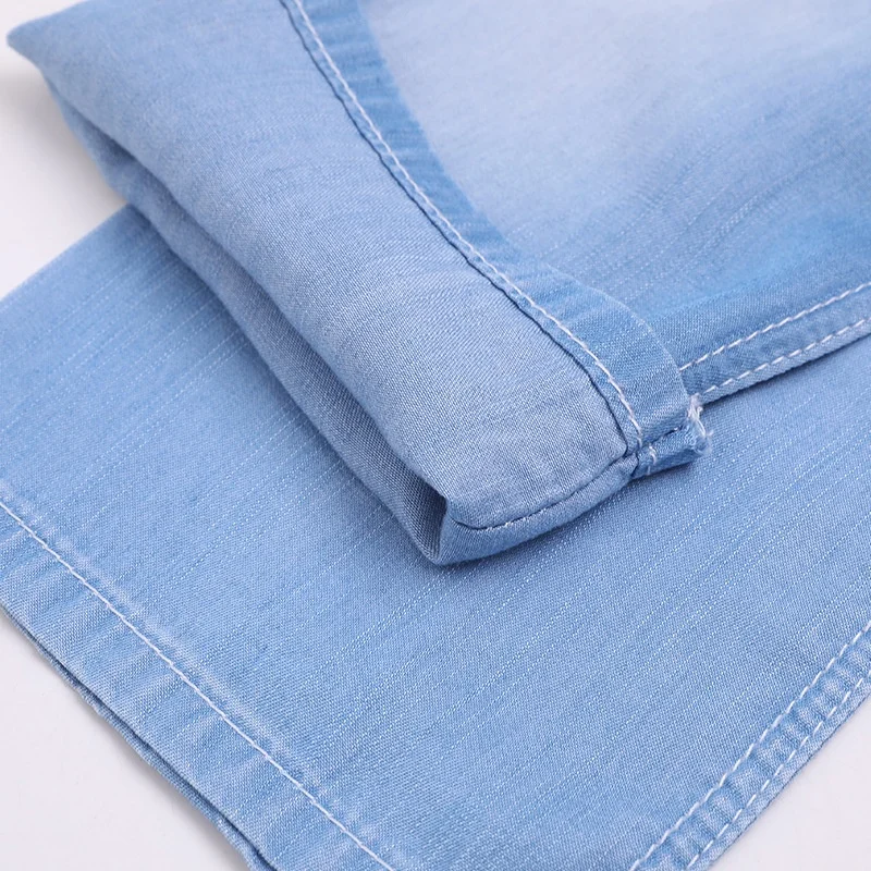 High quality Breathable lyocel jean fabric thin non-stretch 100% tentel 5oz soft denim fabric for jeans