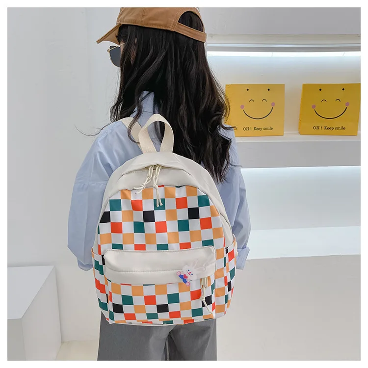 Kindergarten student schoolbag new Korean fashion lattice boy girl baby foreign style light travel backpack