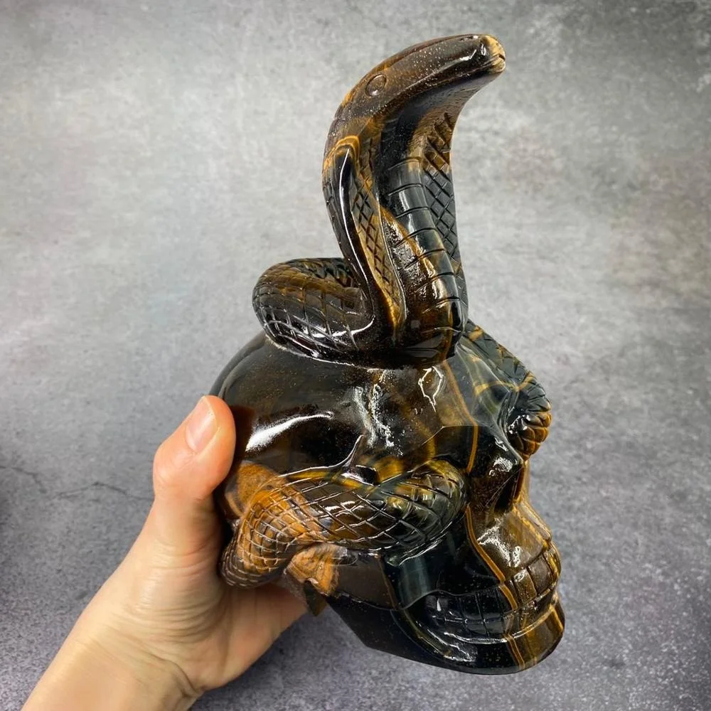 Customized product hand carved crystal skull with snake art sculpture folk crafts tiger eye skull for decoration