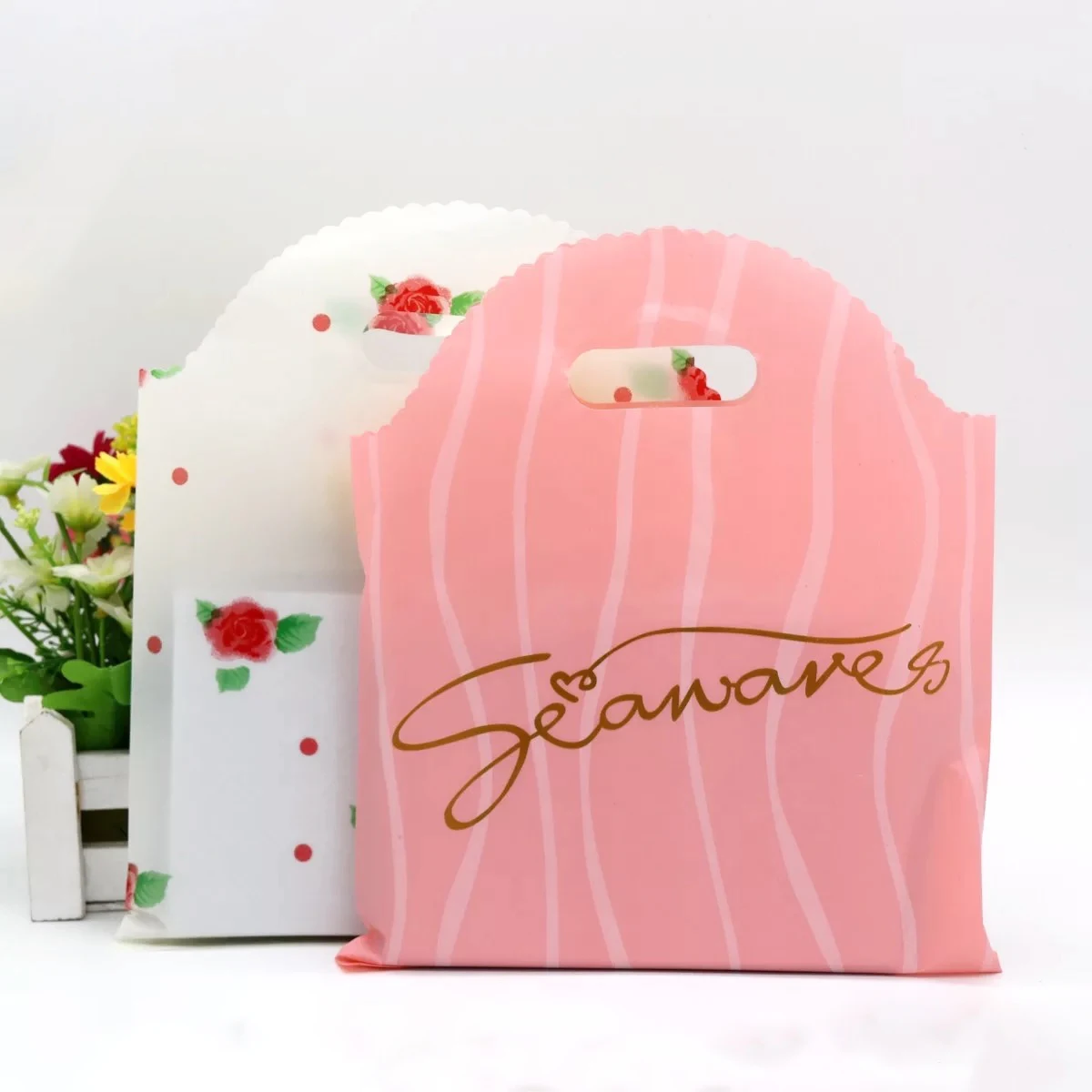 Factory price printed logo design business mini little pp plastic gift clothing bags