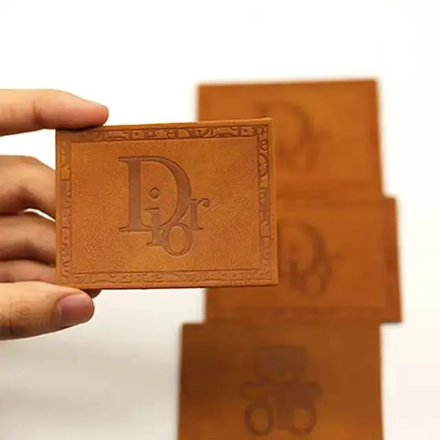 High Quality Hot Stamping China Manufacturer Eco-friendly Custom Logo Embossed suede sewing iron on leather label jeans tag