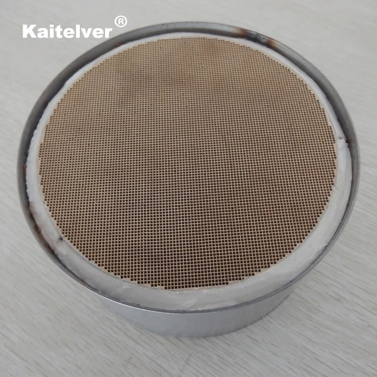 Auto exhaust catalytic converter assembly with rare earth catalyst and honeycomb carrier/support