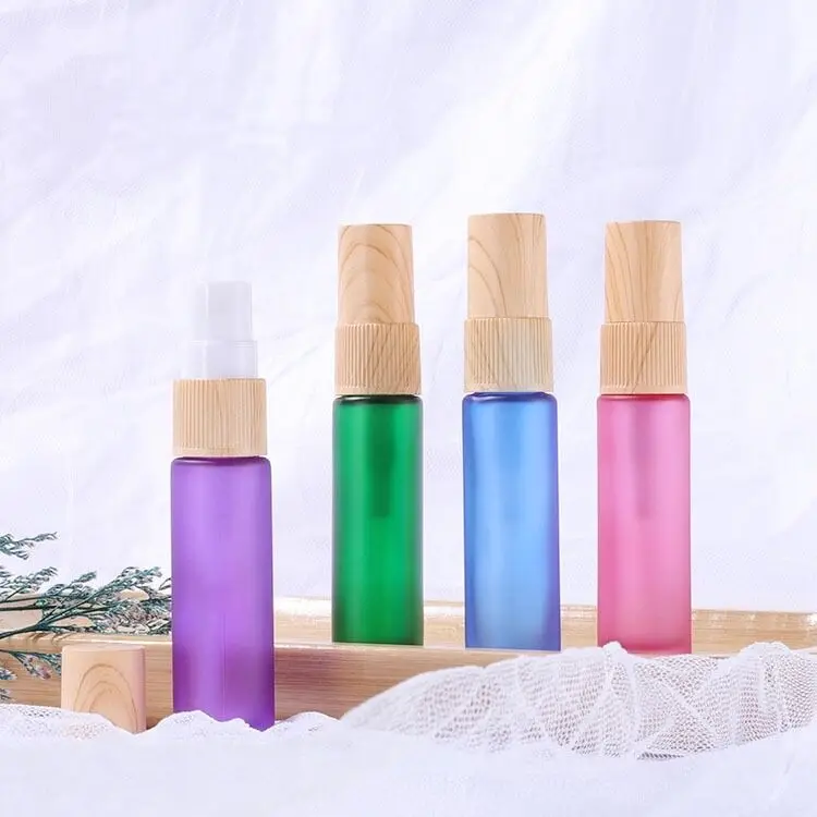 
LOW MOQ frost colorful 10ml roll on glass bottle with wood grain pump 