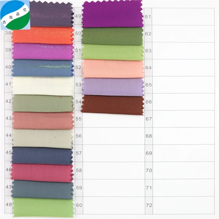 High quality  100% woven rayon and polyester shiny  ready good fabric stock lot for garment