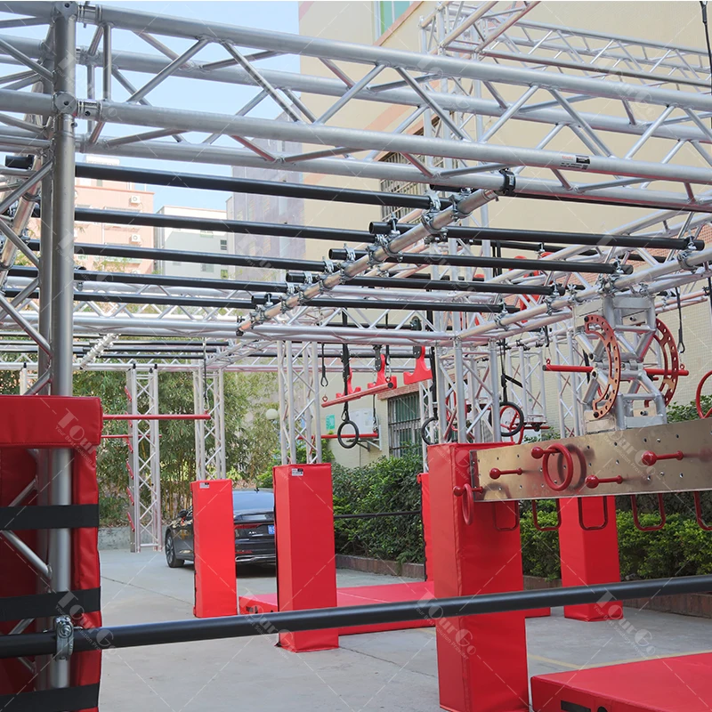 Arm strength training equipment gym fitness facility monkey bars ninja warrior elements obstacle course